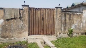 Fenced And Dry Half A Plot Of Land At Ajao Estate Isolo . Lagos Mainland. Cofo.  1 Plot of Land for Sale Isolo Lagos Vetra  Property