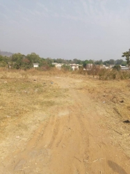 A Land Measuring 2 Hectares, Fenced Round, Suitable For Hotel And Commercial Purpose 2 Hectare of Land for Sale Life Camp Abuja Vetra  Property