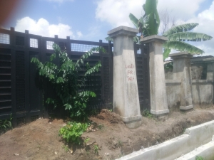 Well Fenced Land With Gate For Sale In Osongama 1,000 Meter Square of Land for Sale Uyo Akwa Ibom Vetra  Property
