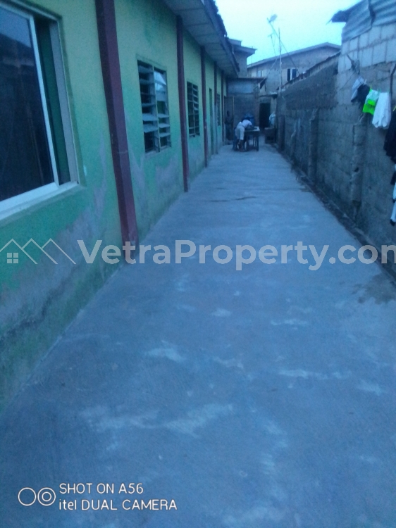  Standard Full Plot Of Land With Structure On Tared Road Street  Land for Sale Alimosho Lagos Vetra  Property
