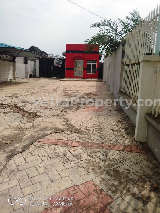  2bedroom Setback And Showroom Suitable For Bar And Carwash Or Car Slot On A Commercial Rd  2 bedroom Show Room for Sale Ikotun Igando Lagos Vetra  Property