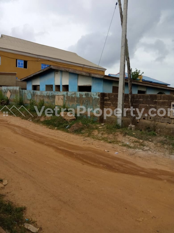  A plot of land with an uncompleted 3bedroom flat on it, by the roadside of Akala express. Good for church and all commercial purposes  Land for Sale Ibadan Oyo Vetra  Property