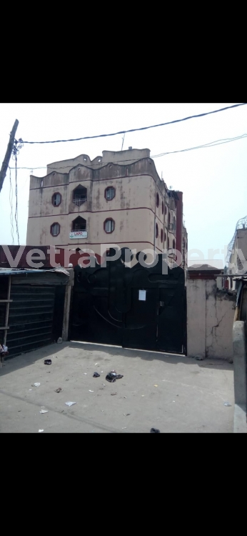  4 storey building with 9 units of 4 bedroom flats and 2 units of warehouse space and 4 shop spaces at Ojo Alaba  5 bedroom Commercial Property for Sale Ojo Lagos Vetra  Property