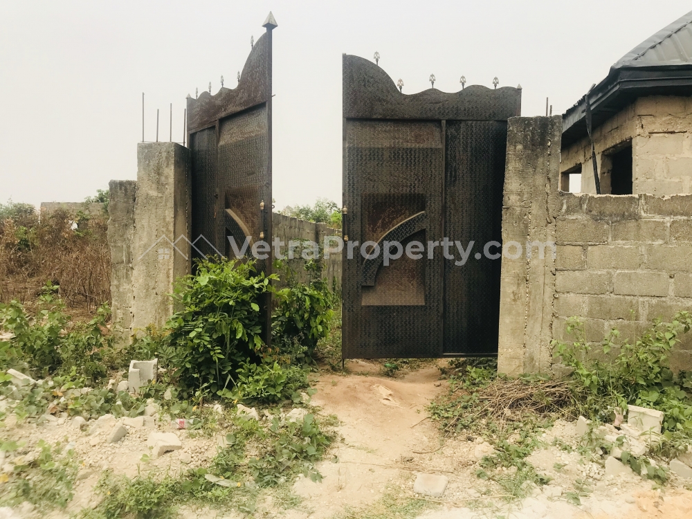  1 Plot of Land fenced, gated with a Security House  Land for Sale Owerri Imo Vetra  Property