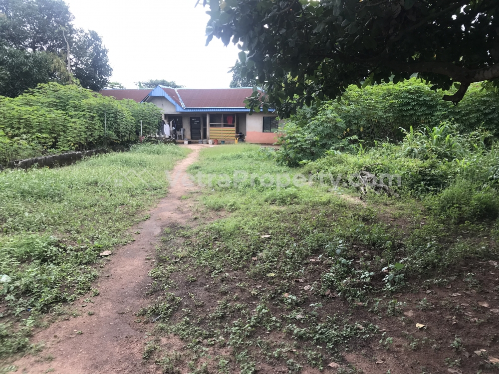  3 Plots of Land with a boys Quarter Bungalow mainly for commercial purpose facing a dual lane  Land for Sale Owerri Imo Vetra  Property