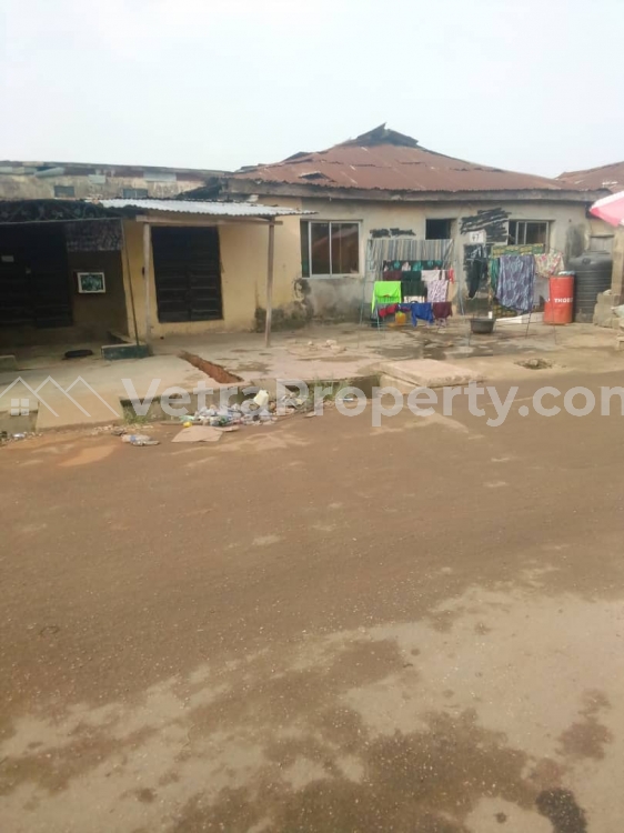  Land with bungalow on EyinOgun street mafoluku oshodi  Land for Sale Oshodi Lagos Vetra  Property
