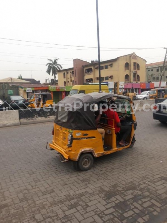  1000sqm commercial bareland directly on Ago palace Expressway  Land for Sale  Lagos Vetra  Property